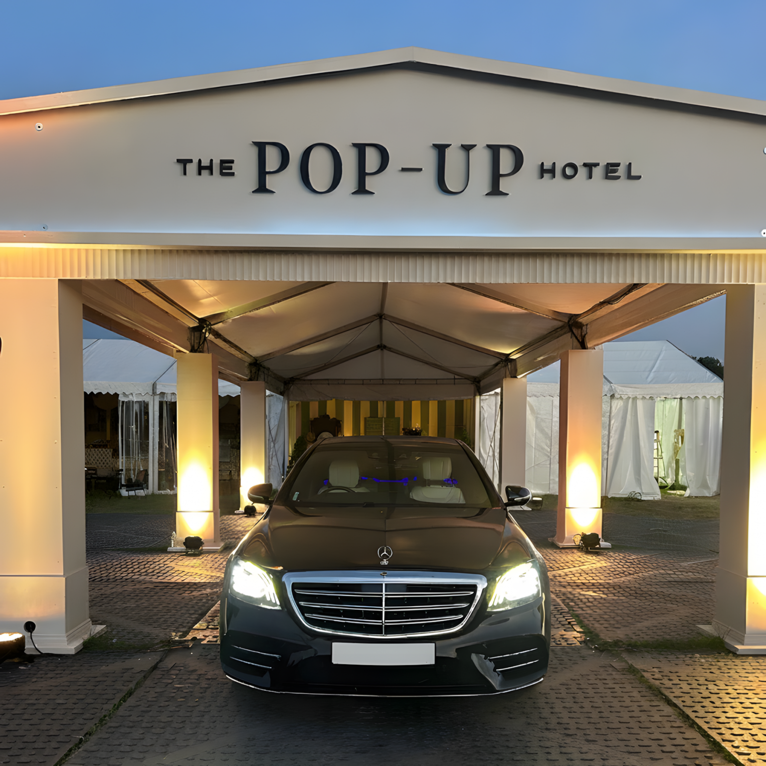 Mercedes S-Class in front of "The Pop-Up Hotel"
